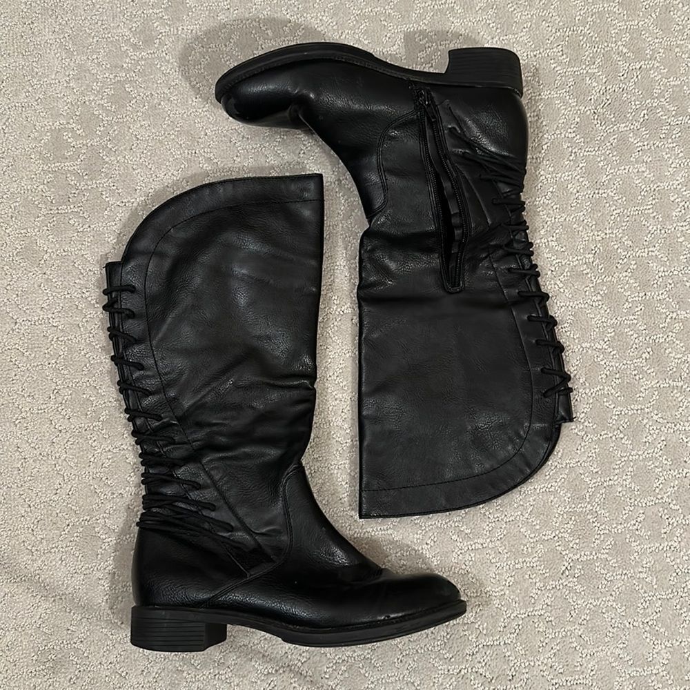 Black leather boots lace up in the back zipper on the sides